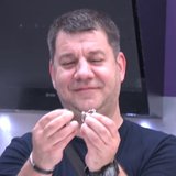 160-1157